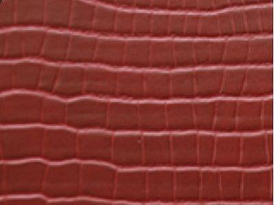 Le panneau intérieur est habillé d'éco-cuir Reptile bleu (simili-cuir à faible impact environnemental)